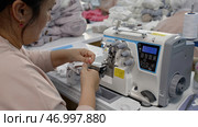 Worker activity in a textile factory. Стоковое фото, фотограф David Kashakhi / Фотобанк Лори