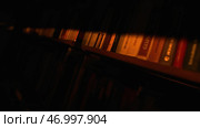 Close up of the books on the shelves of the library. Стоковое фото, фотограф David Kashakhi / Фотобанк Лори