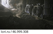 Extracted hot ore in carriage of industrial train at factory. Стоковое фото, фотограф David Kashakhi / Фотобанк Лори