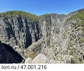 Breathtaking Canyon Landscape Featuring Majestic and Rugged Rock Formations in Nature. Стоковое фото, фотограф David Kashakhi / Фотобанк Лори