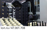 Dubai, UAE - June 2024: Advanced Robotic Automation in Manufacturing Environments for Enhanced Efficiency and Precision. Редакционное фото, фотограф David Kashakhi / Фотобанк Лори