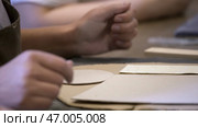 Participate in Hands On Engagement at a Creative Ceramic Art Workshop Experience. Стоковое фото, фотограф David Kashakhi / Фотобанк Лори