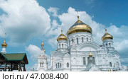 Large beautiful orthodox church on a cloudy sky background. Стоковое фото, фотограф David Kashakhi / Фотобанк Лори
