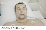 Postoperative period, coma, complications after surgery. Стоковое фото, фотограф David Kashakhi / Фотобанк Лори