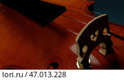 A huge cello made in cartoon animation. Стоковая иллюстрация, иллюстратор David Kashakhi / Фотобанк Лори