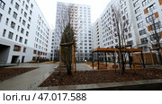Large high-rise houses around enclosed courtyards with playgrounds. Стоковое фото, фотограф David Kashakhi / Фотобанк Лори