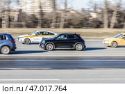 Ora 03 all electric car driving down the street. Редакционное фото, фотограф Константин Григорьев / Фотобанк Лори