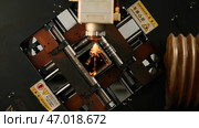Industrial Laser cutting the edge of a square shaped pipe. Стоковое фото, фотограф David Kashakhi / Фотобанк Лори