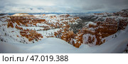 Winter Landscape of Bryce Canyon Showcases Stunning Snow-Covered Rock Formations. Стоковое фото, фотограф Aleksandr Golubev / Фотобанк Лори