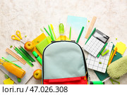 Школьный рюкзак и канцтовары на светлом фоне. Стоковое фото, фотограф Pixel_shot / Фотобанк Лори