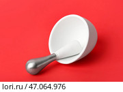 Маточник и пестик на красном фоне. Стоковое фото, фотограф Pixel_shot / Фотобанк Лори