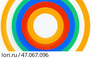 Motion.Twitching bright circles on a white background in animation. Стоковая иллюстрация, иллюстратор David Kashakhi / Фотобанк Лори