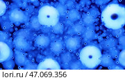 Abstract moving microorganisms or bacteria on a blue background. Стоковая иллюстрация, иллюстратор David Kashakhi / Фотобанк Лори