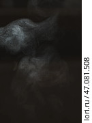 Exploring Abstract Smoke Patterns Created Within a Dark and Enigmatic Atmosphere. Стоковое фото, фотограф David Kashakhi / Фотобанк Лори