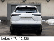 White chinese car Jetour Dashing parked on the city street, rear view. Редакционное фото, фотограф Константин Григорьев / Фотобанк Лори