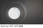 Old projector lens. Стоковое видео, видеограф Михаил Коханчиков / Фотобанк Лори