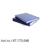Two books in blue cover with white sheets isolated on a white background. Стоковое фото, фотограф Елена  Попкова / Фотобанк Лори