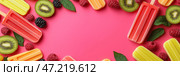 Refreshing summer treats featuring colorful popsicles surrounded by fresh fruits and leaves on a vibrant pink background. Освежающие летние лакомства в виде разноцветных мороженых в окружении свежих фруктов и листьев на ярком розовом фоне. Стоковое AI-изображение, AI-художник Katsiaryna Repich / Фотобанк Лори