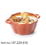 Вкусный крем-суп из тыквы в горшочке на белом фоне. Стоковое фото, фотограф Pixel_shot / Фотобанк Лори