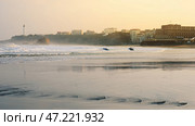 Waves, sunset, surfers - beach and lighthouse of Biarritz. Стоковое фото, фотограф Татьяна Лобанова / Фотобанк Лори