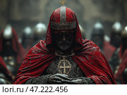 A grim medieval warlord or religious leader, dressed in a red hooded robe and a metal helmet with a cross. His face is dark, with glowing red eyes, giving him a sinister and mystical appearance. A massive cross hangs on his chest, and under his cloak, chain mail is visible, indicating his military status. Around him stand warriors in dark armor, creating the feeling of a secret order or fanatical knightly brotherhood. The atmosphere of the scene is filled with darkness, power and menace, as if before a battle or a ceremony. Стоковое AI-изображение, AI-художник Анна Кривицкая / Фотобанк Лори