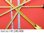 Измерительные ленты на цветном фоне. Стоковое фото, фотограф Pixel_shot / Фотобанк Лори