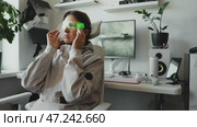 AI-powered cybersecurity expert in neon glasses managing cyber threats. Concept of future technologies, hacking ethics, identity protection, and cyber awareness in modern world. Generative reality. Стоковое AI-видео, аниматор Енваев Андрей / Фотобанк Лори