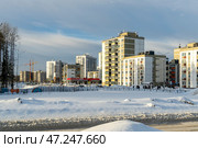 Новое современное жилье в городе Петрозаводске. Многоэтажные высотные дома в районе города Древлянка 5 зимой. Строительство домов ЖК продолжается. Редакционное фото, фотограф Sergei Gorin / Фотобанк Лори