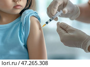 Child receiving vaccination. Smiling little Asian girl in doctor's office is vaccinated. Kid giving injection shot. Syringe with Covid-19, coronavirus, flu vaccine. Dangerous infectious disease, MPOX. Стоковое AI-изображение, AI-художник Марина Демидюк / Фотобанк Лори