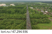 Velikoretsky procession on June 3 and 8 2019 pilgrims carry the icon of Saint Nicholas aerial photography (2020 год). Стоковое видео, видеограф Алексей Сергеев / Фотобанк Лори