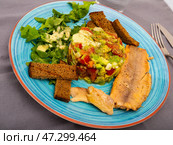 Trout fillets with guacamole salad. Стоковое фото, фотограф Яков Филимонов / Фотобанк Лори