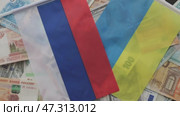 euro, dollar, rubles banknotes lying on black Ukraine russia usa flag, concept. Стоковое видео, видеограф Olesia Kondrateva / Фотобанк Лори