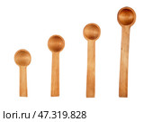 Four wooden spoons. Стоковое фото, фотограф Александр Собко / Фотобанк Лори