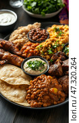 Eritrean injera platter with lentil and meat stews served on colorful textiles in soft natural light. Стоковое AI-изображение, AI-художник 123 12 / Фотобанк Лори