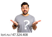 Confused man with beard raising hands, questioning expression, casual gray shirt with question mark, isolated on white background, unsure, shrugging, uncertain, puzzled, doubt, asking. Стоковое AI-изображение, AI-художник Павел Муравьев / Фотобанк Лори