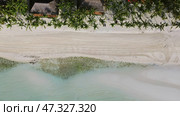 Aerial top view of beautiful tropical sandy beach. Стоковое фото, фотограф Михаил Коханчиков / Фотобанк Лори