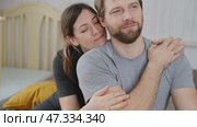 Loving mature couple interactions at home. Man and woman embracing, hugging, holding hands and dancing. Wife with husband intimate moments. couple is touching, cuddling, kissing. Natural lighting. 4K. Стоковое видео, видеограф Марина Демидюк / Фотобанк Лори