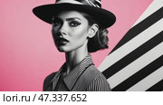 Fashion model posing with zebra striped hat and pinstriped shirt. Стоковое AI-видео, аниматор Юрий Поздников / Фотобанк Лори