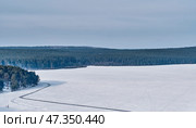 Ice Skating Track on Frozen Pond in Sysert, Russia. Стоковое фото, фотограф Ирина Кононова / Фотобанк Лори