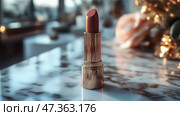 Red lipstick on a marble countertop in a stylish indoor setting. Дерзкая красная помада стоит вертикально на мраморной поверхности. Мягкое освещение и элегантный декор создают изысканную и привлекательную атмосферу. Стоковое AI-изображение, AI-художник Katsiaryna Repich / Фотобанк Лори