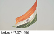 Huge Indian flag winding up on Delhi Square. Стоковое фото, фотограф Mikhail Davidovich / Фотобанк Лори