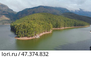 Aerial view beautiful nature with mountains and hills by Lake Mattupetty. Kerala State. Near the city of Munar. Стоковое фото, фотограф Mikhail Davidovich / Фотобанк Лори