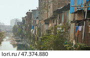 Dharavi slums in east Mumbai. Bandra District, Maharashtra, India. Стоковое фото, фотограф Mikhail Davidovich / Фотобанк Лори