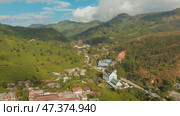Aerial view of drone tea plantations in the vicinity of the city of Munnar. Nallatanni village. Kerala. India. Стоковое фото, фотограф Mikhail Davidovich / Фотобанк Лори