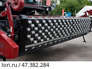 Agricultural machinery close-up with metal components and red frame. Стоковое фото, фотограф Вербицкая Светлана / Фотобанк Лори