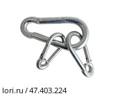 Альпинистские карабины на белом фоне. Climber carabiners on a white background. Стоковое фото, фотограф Татьяна Д / Фотобанк Лори