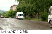 an ambulance is driving along the roads of a provincial Russian town. Стоковое видео, видеограф Алексей Сергеев / Фотобанк Лори