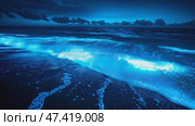 A mysterious seaside with water under a night sky full of bio luminescent creatures emitting mysterious light. Стоковое AI-видео, аниматор Ирина Ручушкина / Фотобанк Лори