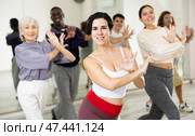Young Hispanic woman practicing vigorous dance movements. Стоковое фото, фотограф Яков Филимонов / Фотобанк Лори