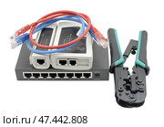Роутер, кабельный тестер и соединительные кабели. Closeup of network cables connected to router on white. Стоковое фото, фотограф Татьяна Д / Фотобанк Лори